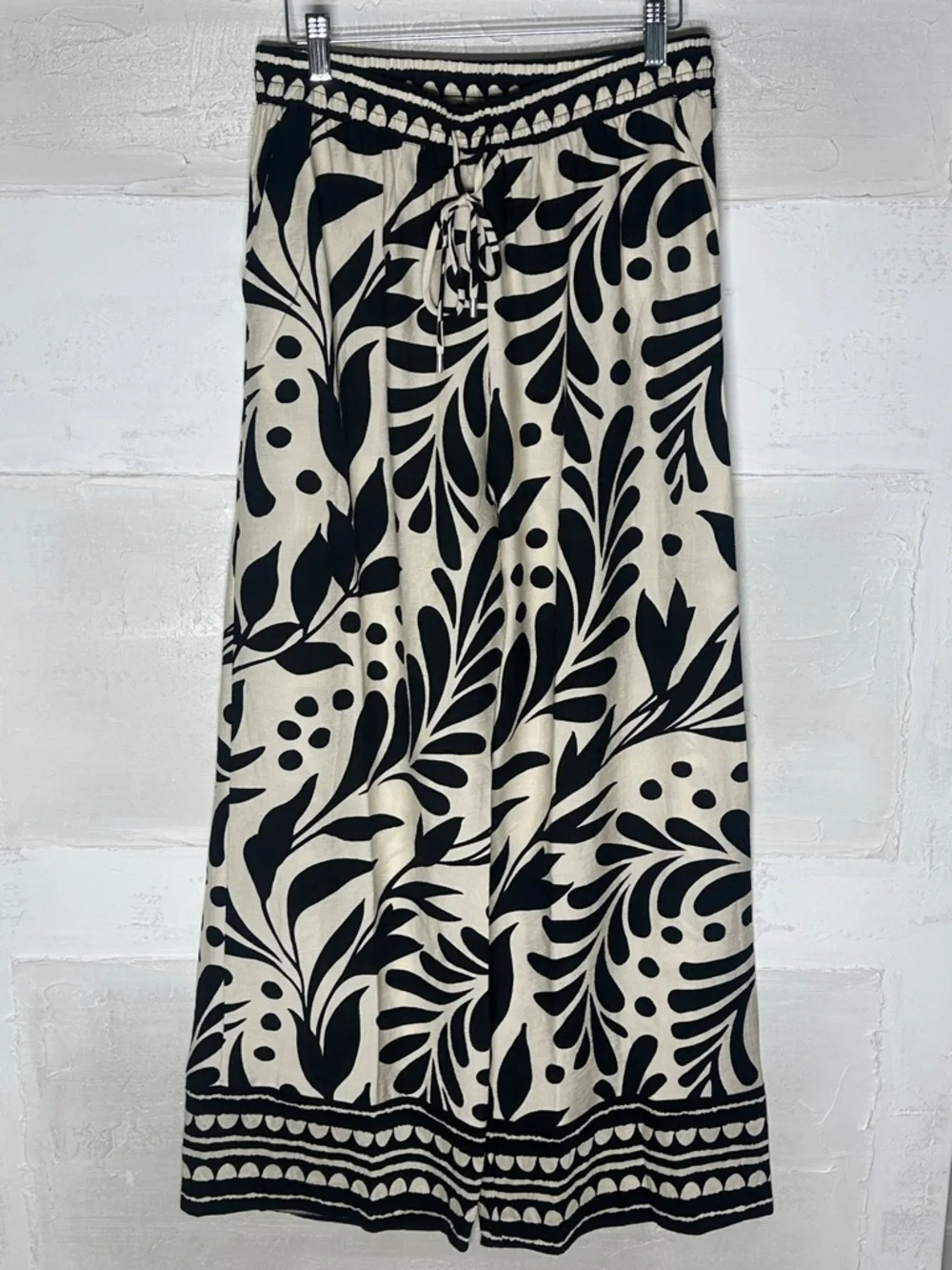 New w tags. Skies are Blue ivory black pants. Drawstring wide leg pockets medium